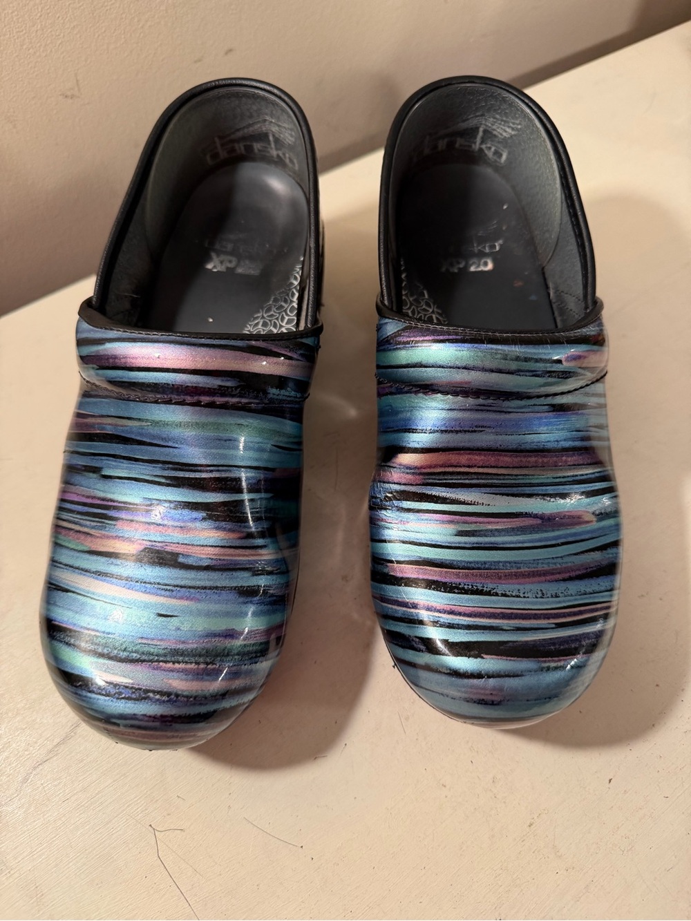 Dansko Iridescent Blue, Purple and Black Striped Clogs